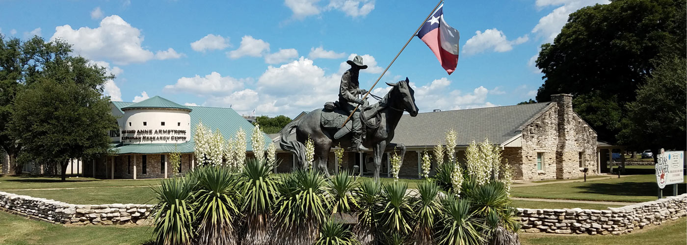 "Texas Ranger" sculpture in front of museum