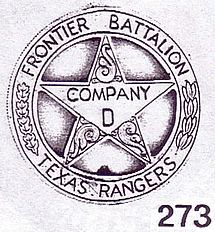 A copy of a circle star badge with the words "Frontier Battalion" along the top of the circle, "Texas Rangers" along the bottom, and "Company D" in the center of the star. There are swirls decorating the spaces in the star without words and leaves going up the side of the circle..