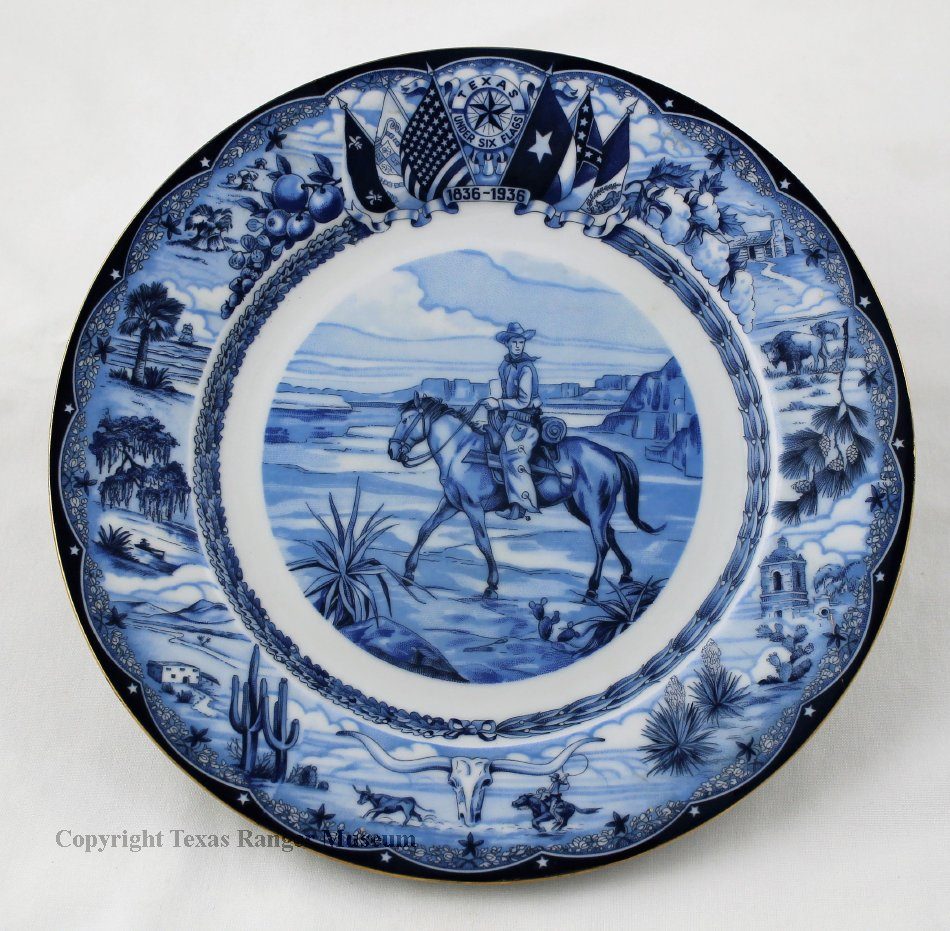 A blue inked white china plate with a cowboy on a horse in the middle, various Texas scenes along the edges, and the six flags of Texas at the top.